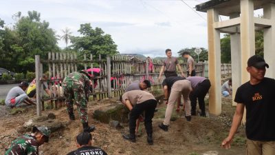 HUT Bhayangkara ke-78: Polres Bolmut dan TNI Bersatu dalam Bhakti Sosial