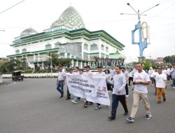 Abdullah Mokoginta Hadiri Jalan Sehat Kerukunan untuk Pilkada Damai 2024