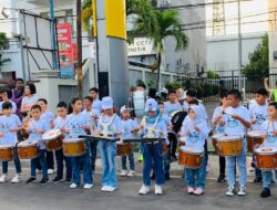 Marching Band SDN 41 Hulonthalangi Warnai Air Fun Run 2025, Tampil Perdana di Rute Maraton